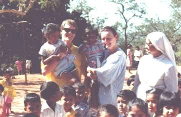 Dave & Angie with their two Godchildren in Goa who's education they sponsor.