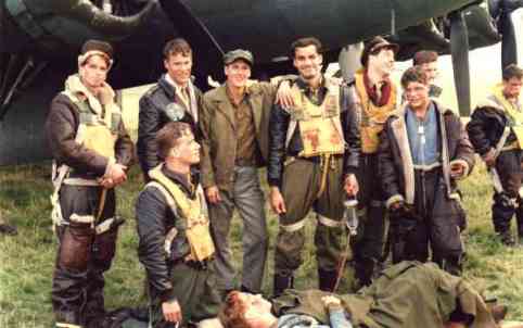 Cast of Memphis Belle - Eric Stoltz on floor, still on stretcher
